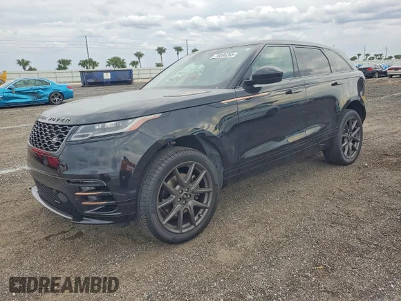 ✅ 2023 Land Rover Range Rover Velar R-Dynamic S • VIN: SALYT2EX3PA351350 • Lot: 76886265. Wystawiony na Copart z przebiegiem 28 679 mil. Bezpłatny archiwum sprzedaży aukcyjnych z USA i szczegółowy raport historii pojazdu na DreamBid. Zdjęcie 1.