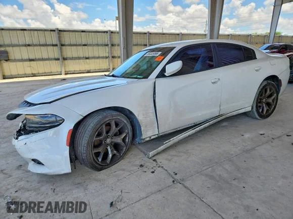 ✅ 2015 Dodge Charger SXT • VIN: 2C3CDXHG3FH900282 • Lot: 56445996. Listed on Copart with 123,384 mi. Free auction sales archive from the USA and detailed vehicle history report at DreamBid. Image 1.