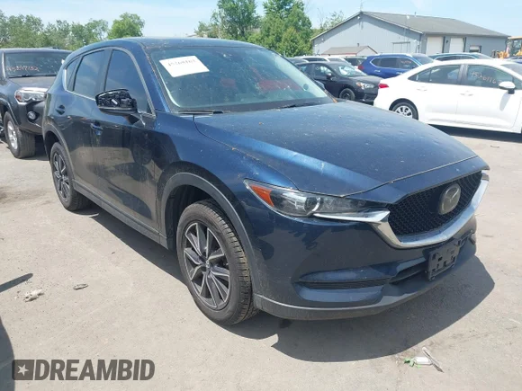✅ 2018 Mazda CX-5 Touring • VIN: JM3KFBCM2J0400734 • Lot: 45268162. Wystawiony na IAAI z przebiegiem 94 817 mil. Bezpłatny archiwum sprzedaży aukcyjnych z USA i szczegółowy raport historii pojazdu na DreamBid. Zdjęcie 1.
