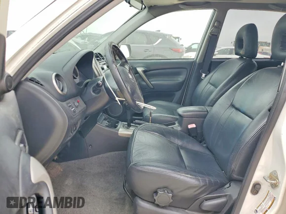 ✅ 2004 Toyota RAV4 • VIN: JTEGD20V940006214 • Lot: 52580826. Wystawiony na Copart z przebiegiem 185 479 mil. Bezpłatny archiwum sprzedaży aukcyjnych z USA i szczegółowy raport historii pojazdu na DreamBid. Zdjęcie 7.