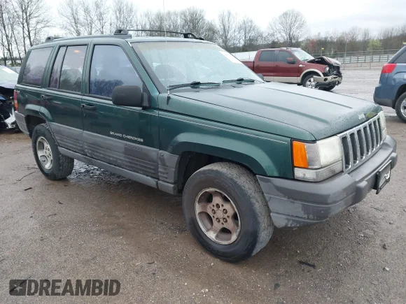 ✅ 1996 Jeep Grand Cherokee Laredo • VIN: 1J4GZ58S9TC162407 • Лот: 44579359. Опубликован ранее на IAAI с пробегом 297 000 миль. Бесплатный доступ к архиву аукционных продаж из США и подробный отчёт об истории автомобиля на DreamBid. Изображение 1.