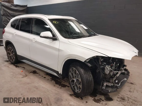 ✅ 2021 BMW X1 xDrive28i • VIN: WBXJG9C0XM5T76975 • Лот: 41310115. Опубликован ранее на IAAI с пробегом 26 869 миль. Бесплатный доступ к архиву аукционных продаж из США и подробный отчёт об истории автомобиля на DreamBid. Изображение 1.