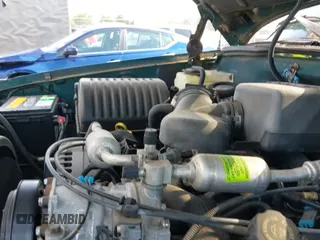 ✅ 1997 GMC Yukon • VIN: 1GKEK13R8VJ752342 • Lot: 42738297. Wystawiony na IAAI z przebiegiem 161 355 mil. Bezpłatny archiwum sprzedaży aukcyjnych z USA i szczegółowy raport historii pojazdu na DreamBid. Zdjęcie 12.