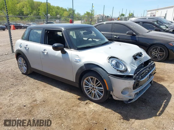 ✅ 2021 MINI Hardtop 4 Door Cooper S • VIN: WMWXU9C05M2M92194 • Лот: 45128709. Опубліковано раніше на IAAI з пробігом 19 841 миль. Безкоштовний доступ до архіву аукціонних продажів зі США та докладний звіт про історію автомобіля на DreamBid. Зображення 1.