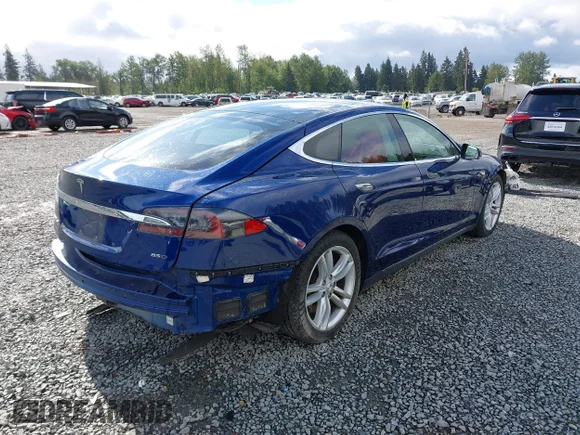 ✅ 2015 Tesla Model S 85D • VIN: 5YJSA1H25FF094971 • Lot: 42309099. Listed on IAAI with 62,532 mi. Free auction sales archive from the USA and detailed vehicle history report at DreamBid. Image 4.