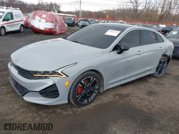✅ 2021 Kia K5 GT-Line • VIN: 5XXG64J20MG053886 • Лот: 41853531. Опубліковано раніше на IAAI з пробігом 59 111 миль. Безкоштовний доступ до архіву аукціонних продажів зі США та докладний звіт про історію автомобіля на DreamBid. Зображення 2.
