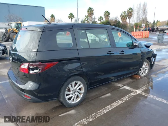 ✅ 2015 Mazda 5 Sport • VIN: JM1CW2BL1F0184498 • Лот: 39903933. Опубліковано раніше на IAAI з пробігом 90 905 миль. Безкоштовний доступ до архіву аукціонних продажів зі США та докладний звіт про історію автомобіля на DreamBid. Зображення 4.