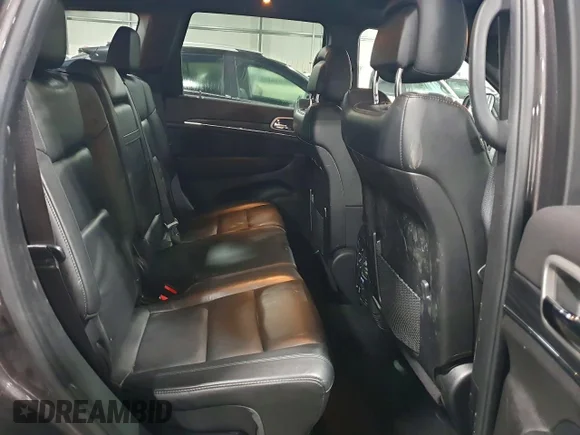 ✅ 2021 Jeep Grand Cherokee Limited • VIN: 1C4RJFBG1MC704293 • Лот: 74038085. Опубликован ранее на Copart с пробегом 133 313 миль. Бесплатный доступ к архиву аукционных продаж из США и подробный отчёт об истории автомобиля на DreamBid. Изображение 11.
