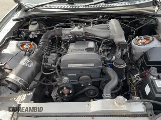 ✅ 1993 Toyota Supra • VIN: JZA800010229 • Лот: 50000065. Опубликован ранее на Copart с пробегом 130 612 миль. Бесплатный доступ к архиву аукционных продаж из США и подробный отчёт об истории автомобиля на DreamBid. Изображение 11.