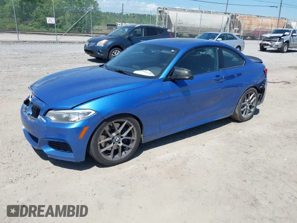 ✅ 2015 BMW 2 Series M235i • VIN: WBA1J7C52FV253606 • Lot: 44942110. Listed on IAAI with 64,582 mi. Free auction sales archive from the USA and detailed vehicle history report at DreamBid. Image 2.