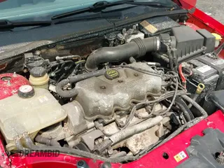 ✅ 2002 Ford Focus LX • VIN: 1FAFP33P72W155747 • Lot: 43158430. Wystawiony na IAAI z przebiegiem 179 810 mil. Bezpłatny archiwum sprzedaży aukcyjnych z USA i szczegółowy raport historii pojazdu na DreamBid. Zdjęcie 14.