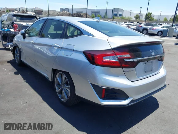 ✅ 2018 Honda Clarity Touring • VIN: JHMZC5F32JC016924 • Lot: 45159320. Wystawiony na IAAI z przebiegiem 121 999 mil. Bezpłatny archiwum sprzedaży aukcyjnych z USA i szczegółowy raport historii pojazdu na DreamBid. Zdjęcie 3.