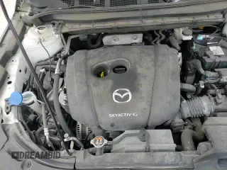 ✅ 2021 Mazda CX-5 Sport • VIN: JM3KFABM5M0330789 • Лот: 69243785. Опубликован ранее на Copart с пробегом 80 044 миль. Бесплатный доступ к архиву аукционных продаж из США и подробный отчёт об истории автомобиля на DreamBid. Изображение 14.