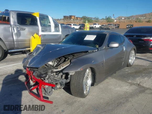 ✅ 2010 Nissan 370Z Touring • VIN: JN1AZ4EH6AM505442 • Lot: 43561053. Wystawiony na IAAI z przebiegiem 167 516 mil. Bezpłatny archiwum sprzedaży aukcyjnych z USA i szczegółowy raport historii pojazdu na DreamBid. Zdjęcie 2.