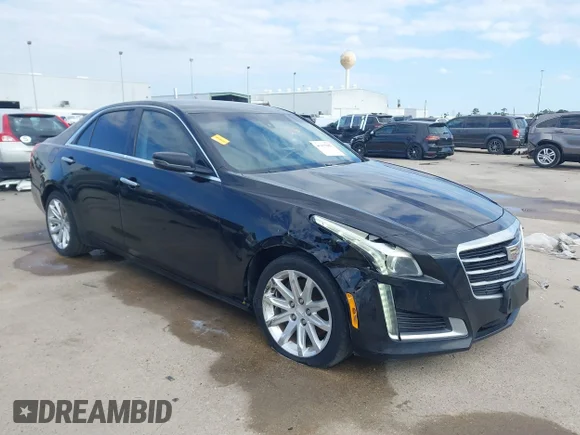 ✅ 2016 Cadillac CTS AWD • VIN: 1G6AW5SX3G0125243 • Лот: 41115105. Опубликован ранее на IAAI с пробегом 142 394 миль. Бесплатный доступ к архиву аукционных продаж из США и подробный отчёт об истории автомобиля на DreamBid. Изображение 1.