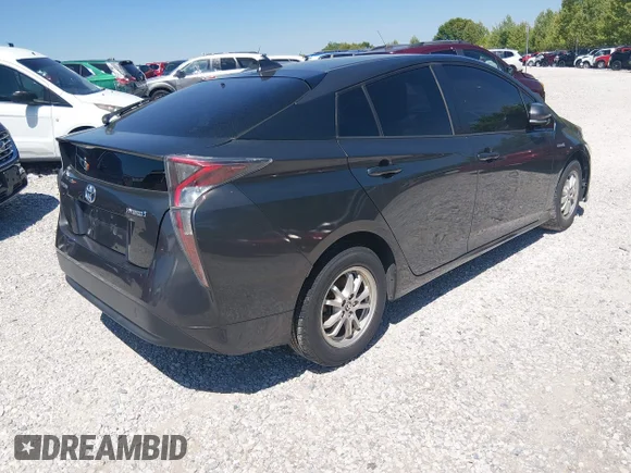 ✅ 2016 Toyota Prius Two Eco • VIN: JTDKARFU1G3018830 • Lot: 44844505. Wystawiony na IAAI z przebiegiem 246 456 mil. Bezpłatny archiwum sprzedaży aukcyjnych z USA i szczegółowy raport historii pojazdu na DreamBid. Zdjęcie 4.