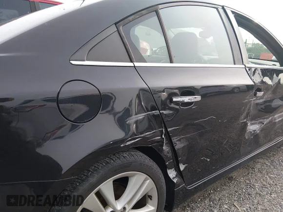 ✅ 2015 Chevrolet Cruze LTZ • VIN: 1G1PG5SB2F7248698 • Лот: 45188488. Опубліковано раніше на IAAI з пробігом 113 862 миль. Безкоштовний доступ до архіву аукціонних продажів зі США та докладний звіт про історію автомобіля на DreamBid. Зображення 6.
