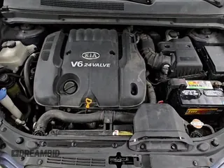 ✅ 2007 Kia Rondo EX • VIN: KNAFG526877096902 • Лот: 84612245. Опубликован ранее на Copart с пробегом 173 516 миль. Бесплатный доступ к архиву аукционных продаж из США и подробный отчёт об истории автомобиля на DreamBid. Изображение 14.