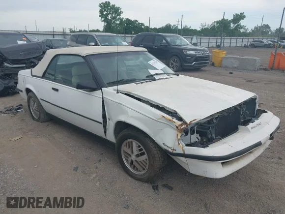 ✅ 1987 Pontiac Sunbird • VIN: 1G2JD31K1H7575709 • Lot: 42335768. Listed on IAAI with 613,977 mi. Free auction sales archive from the USA and detailed vehicle history report at DreamBid. Image 1.