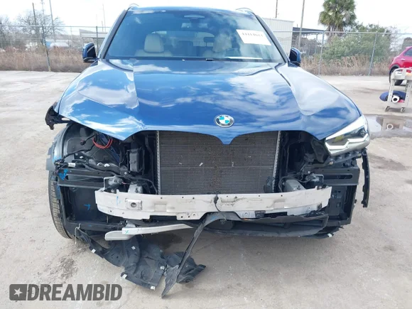 ✅ 2021 BMW X5 xDrive45e • VIN: 5UXTA6C03M9G66149 • Lot: 44414023. Listed on IAAI with 72,398 mi. Free auction sales archive from the USA and detailed vehicle history report at DreamBid. Image 6.