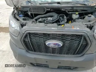 ✅ 2021 Ford Transit Cargo • VIN: 1FTBR1X89MKA53998 • Lot: 59292575. Listed on Copart with 85,472 mi. Free auction sales archive from the USA and detailed vehicle history report at DreamBid. Image 14.