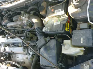 ✅ 1998 Mazda Protege DX • VIN: JM1BC1410W0231000 • Lot: 43188561. Listed on IAAI with 103,995 mi. Free auction sales archive from the USA and detailed vehicle history report at DreamBid. Image 13.