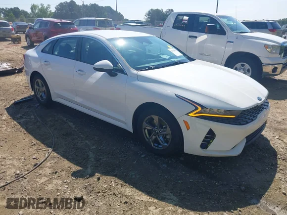 ✅ 2021 Kia K5 LXS • VIN: 5XXG14J26MG050439 • Лот: 42332878. Опубліковано раніше на IAAI з пробігом 99 021 миль. Безкоштовний доступ до архіву аукціонних продажів зі США та докладний звіт про історію автомобіля на DreamBid. Зображення 1.
