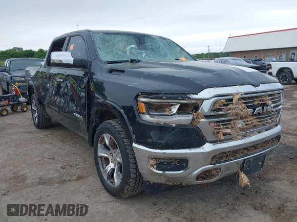 ✅ 2019 Ram 1500 Laramie • VIN: 1C6SRFJT0KN845406 • Lot: 44977168. Listed on IAAI with 126,172 mi. Free auction sales archive from the USA and detailed vehicle history report at DreamBid. Image 1.