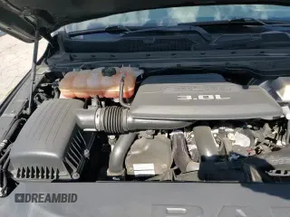 2020 Ram 1500 Rebel z VIN 1C6SRFLM2LN271477, wystawiony jako Copart lot #84295705 z przebiegiem 116 217 mil mil oraz Szkoda całkowita • Salvage title. Historia ofert i sprzedaży dostępna na DreamBid. Obrazek 16.