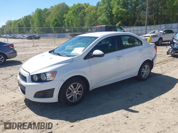 ✅ 2014 Chevrolet Sonic LT • VIN: 1G1JC5SH5E4211571 • Lot: 44807348. Wystawiony na IAAI z przebiegiem 157 214 mil. Bezpłatny archiwum sprzedaży aukcyjnych z USA i szczegółowy raport historii pojazdu na DreamBid. Zdjęcie 2.