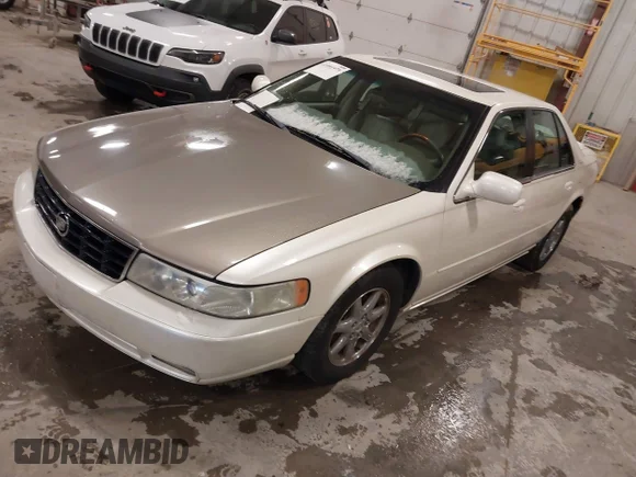 ✅ 2002 Cadillac Seville Touring STS • VIN: 1G6KY54942U137349 • Lot: 41991979. Wystawiony na IAAI z przebiegiem 143 169 mil. Bezpłatny archiwum sprzedaży aukcyjnych z USA i szczegółowy raport historii pojazdu na DreamBid. Zdjęcie 2.