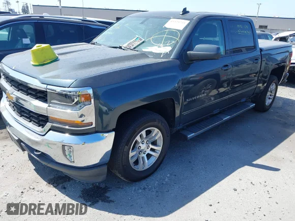 ✅ 2018 Chevrolet Silverado 1500 LT • VIN: 3GCPCREC1JG266086 • Лот: 45329733. Опубликован ранее на IAAI с пробегом 96 026 миль. Бесплатный доступ к архиву аукционных продаж из США и подробный отчёт об истории автомобиля на DreamBid. Изображение 2.