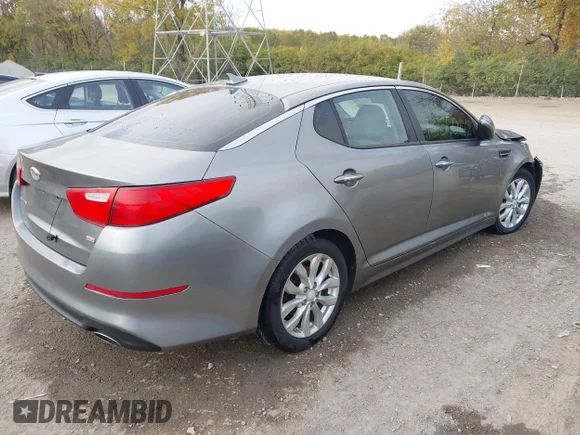 ✅ 2014 Kia Optima LX • VIN: 5XXGM4A77EG303109 • Lot: 43560447. Listed on IAAI with 149,076 mi. Free auction sales archive from the USA and detailed vehicle history report at DreamBid. Image 4.