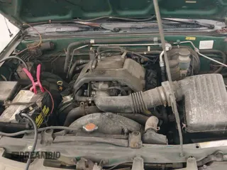 ✅ 1999 Isuzu Rodeo • VIN: 4S2CK57W6X4316539 • Lot: 42267214. Listed on IAAI with 186,480 mi. Free auction sales archive from the USA and detailed vehicle history report at DreamBid. Image 13.