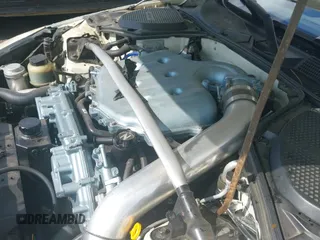 ✅ 2003 Nissan 350Z Touring • VIN: JN1AZ34E23T011900 • Лот: 42446339. Опубликован ранее на IAAI с пробегом 134 471 миль. Бесплатный доступ к архиву аукционных продаж из США и подробный отчёт об истории автомобиля на DreamBid. Изображение 19.