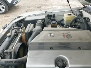 ✅ 1999 Lexus LX 470 • VIN: JT6HT00W0X0037341 • Lot: 41813009. Listed on IAAI with 190,343 mi. Free auction sales archive from the USA and detailed vehicle history report at DreamBid. Image 14.