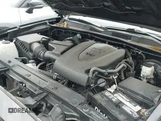 ✅ 2020 Toyota Tacoma SR5 • VIN: 3TMCZ5AN1LM306362 • Lot: 42086958. Listed on IAAI with 67,682 mi. Free auction sales archive from the USA and detailed vehicle history report at DreamBid. Image 19.