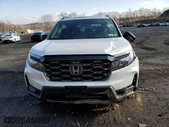 ✅ 2022 Honda Passport TrailSport • VIN: 5FNYF8H69NB001312 • Лот: 35850053. Опубликован ранее на Copart с пробегом 15 415 миль. Бесплатный доступ к архиву аукционных продаж из США и подробный отчёт об истории автомобиля на DreamBid. Изображение 5.