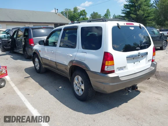 ✅ 2003 Mazda Tribute ES • VIN: 4F2CZ96103KM27923 • Lot: 42779704. Wystawiony na IAAI z przebiegiem 195 439 mil. Bezpłatny archiwum sprzedaży aukcyjnych z USA i szczegółowy raport historii pojazdu na DreamBid. Zdjęcie 3.
