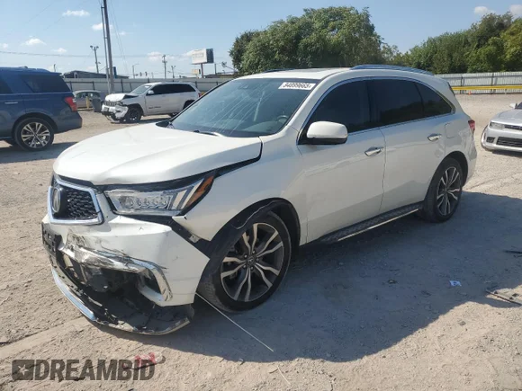 ✅ 2019 Acura MDX Advance • VIN: 5J8YD4H87KL021472 • Lot: 84899665. Listed on Copart with 95,891 mi. Free auction sales archive from the USA and detailed vehicle history report at DreamBid. Image 1.