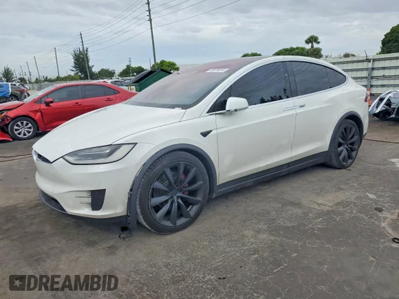 ✅ 2017 Tesla Model X 90D • VIN: 5YJXCBE29HF039274 • Lot: 56124616. Wystawiony na Copart z przebiegiem 142 925 mil. Bezpłatny archiwum sprzedaży aukcyjnych z USA i szczegółowy raport historii pojazdu na DreamBid. Zdjęcie 1.