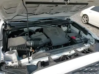 ✅ 2023 Toyota Tacoma TRD Off Road • VIN: 3TYCZ5AN7PT150094 • Лот: 67764465. Опубликован ранее на Copart с пробегом 20 927 миль. Бесплатный доступ к архиву аукционных продаж из США и подробный отчёт об истории автомобиля на DreamBid. Изображение 13.