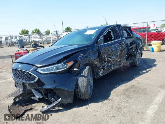 ✅ 2019 Ford Fusion Sport • VIN: 3FA6P0VP0KR179578 • Lot: 42952520. Wystawiony na IAAI z przebiegiem 105 429 mil. Bezpłatny archiwum sprzedaży aukcyjnych z USA i szczegółowy raport historii pojazdu na DreamBid. Zdjęcie 2.