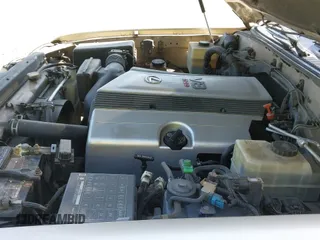 ✅ 2000 Lexus LX 470 • VIN: JT6HT00W0Y0091143 • Lot: 42398168. Wystawiony na IAAI z przebiegiem 259 223 mil. Bezpłatny archiwum sprzedaży aukcyjnych z USA i szczegółowy raport historii pojazdu na DreamBid. Zdjęcie 20.