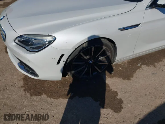 ✅ 2016 BMW 6 Series 650i • VIN: WBA6D4C50GD977359 • Лот: 43447585. Опубліковано раніше на IAAI з пробігом 73 940 миль. Безкоштовний доступ до архіву аукціонних продажів зі США та докладний звіт про історію автомобіля на DreamBid. Зображення 6.