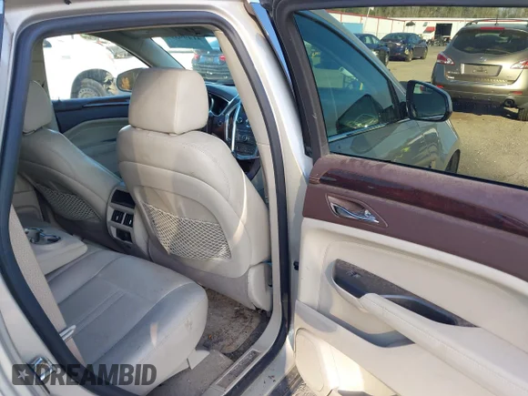 ✅ 2012 Cadillac SRX Luxury Collection • VIN: 3GYFNAE33CS567203 • Lot: 41499395. Wystawiony na IAAI z przebiegiem 78 304 mil. Bezpłatny archiwum sprzedaży aukcyjnych z USA i szczegółowy raport historii pojazdu na DreamBid. Zdjęcie 8.