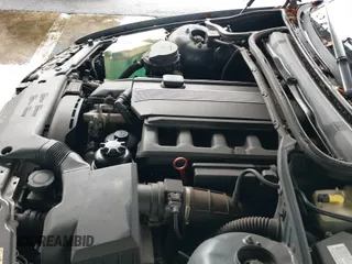 ✅ 2000 BMW 3 Series 323i • VIN: WBAAM334XYCB24411 • Lot: 42112597. Listed on IAAI with 94,813 mi. Free auction sales archive from the USA and detailed vehicle history report at DreamBid. Image 12.