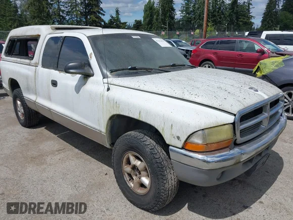 ✅ 1997 Dodge Dakota • VIN: 1B7GG23Y5VS156117 • Lot: 45293621. Wystawiony na IAAI z przebiegiem 197 248 mil. Bezpłatny archiwum sprzedaży aukcyjnych z USA i szczegółowy raport historii pojazdu na DreamBid. Zdjęcie 1.