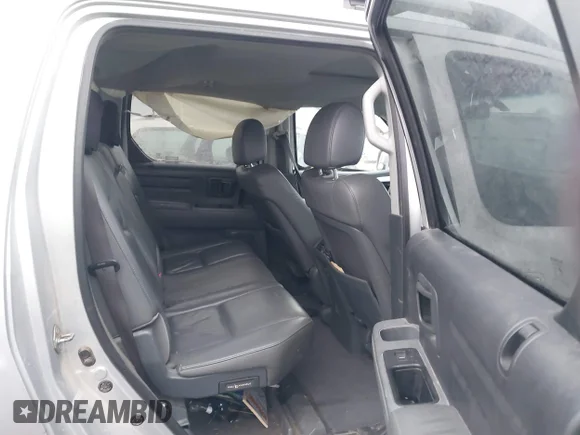 ✅ 2007 Honda Ridgeline RTL • VIN: 2HJYK16587H502567 • Lot: 41290952. Wystawiony na IAAI z przebiegiem 208 824 mil. Bezpłatny archiwum sprzedaży aukcyjnych z USA i szczegółowy raport historii pojazdu na DreamBid. Zdjęcie 8.