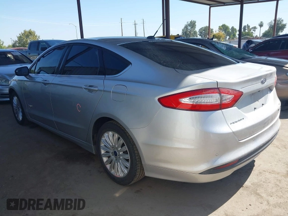 ✅ 2016 Ford Fusion SE Hybrid • VIN: 3FA6P0LU2GR157212 • Lot: 42986139. Wystawiony na IAAI z przebiegiem 199 780 mil. Bezpłatny archiwum sprzedaży aukcyjnych z USA i szczegółowy raport historii pojazdu na DreamBid. Zdjęcie 3.